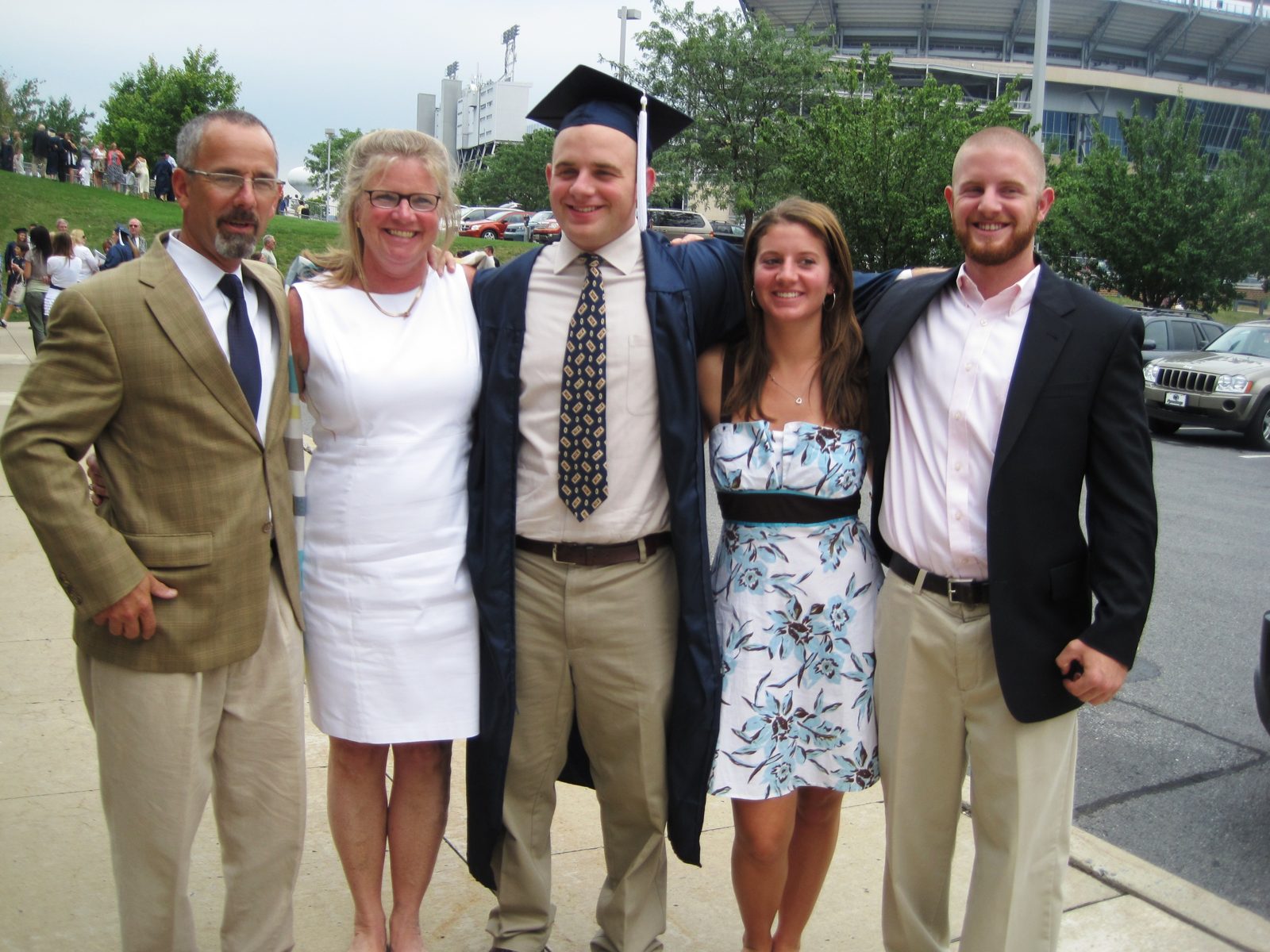 Abby with her family at a graduation